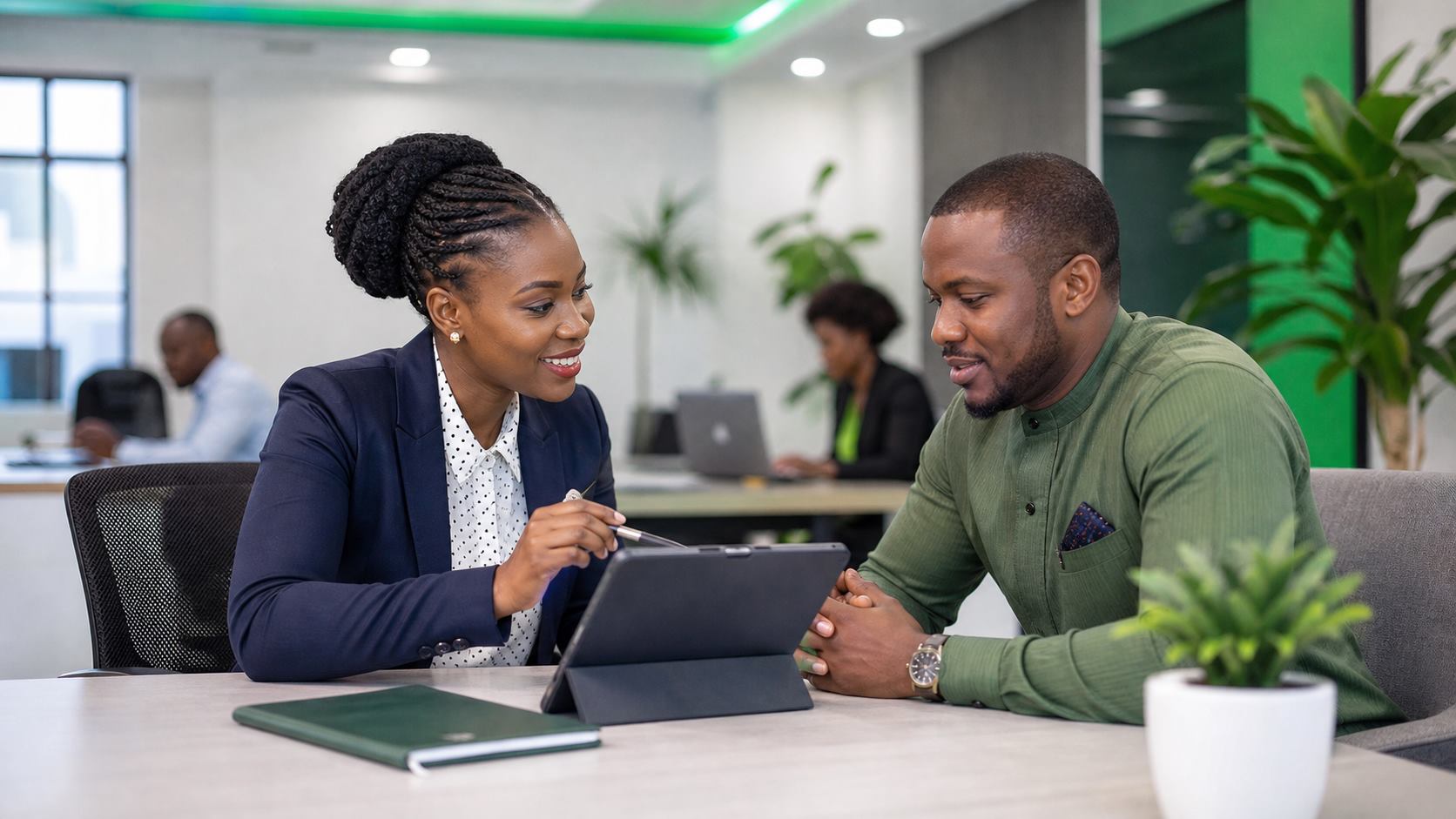 Business owner and recruitment consultant reviewing staff requirements in Lagos